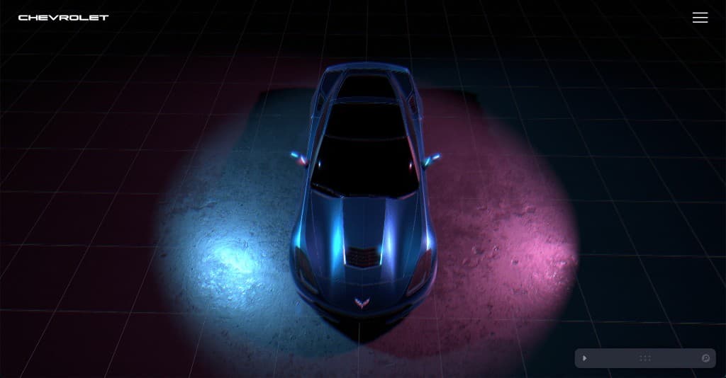 Chevrolet Three.js showroom — Corvette on a dark grid with orbit controls