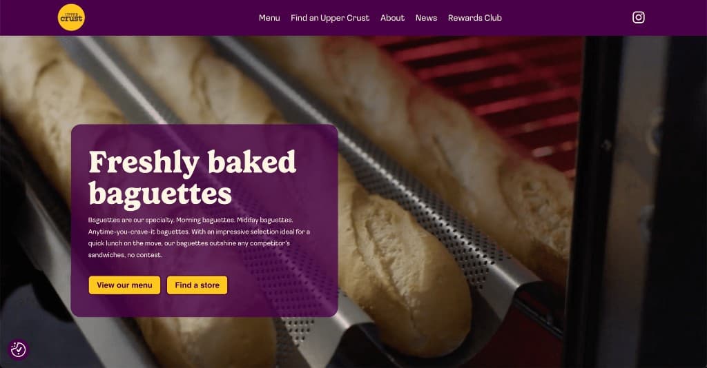 Upper Crust homepage — baguette photography with menu and store-finder controls